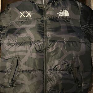 The North Face Black Kaws Puffer Jacket